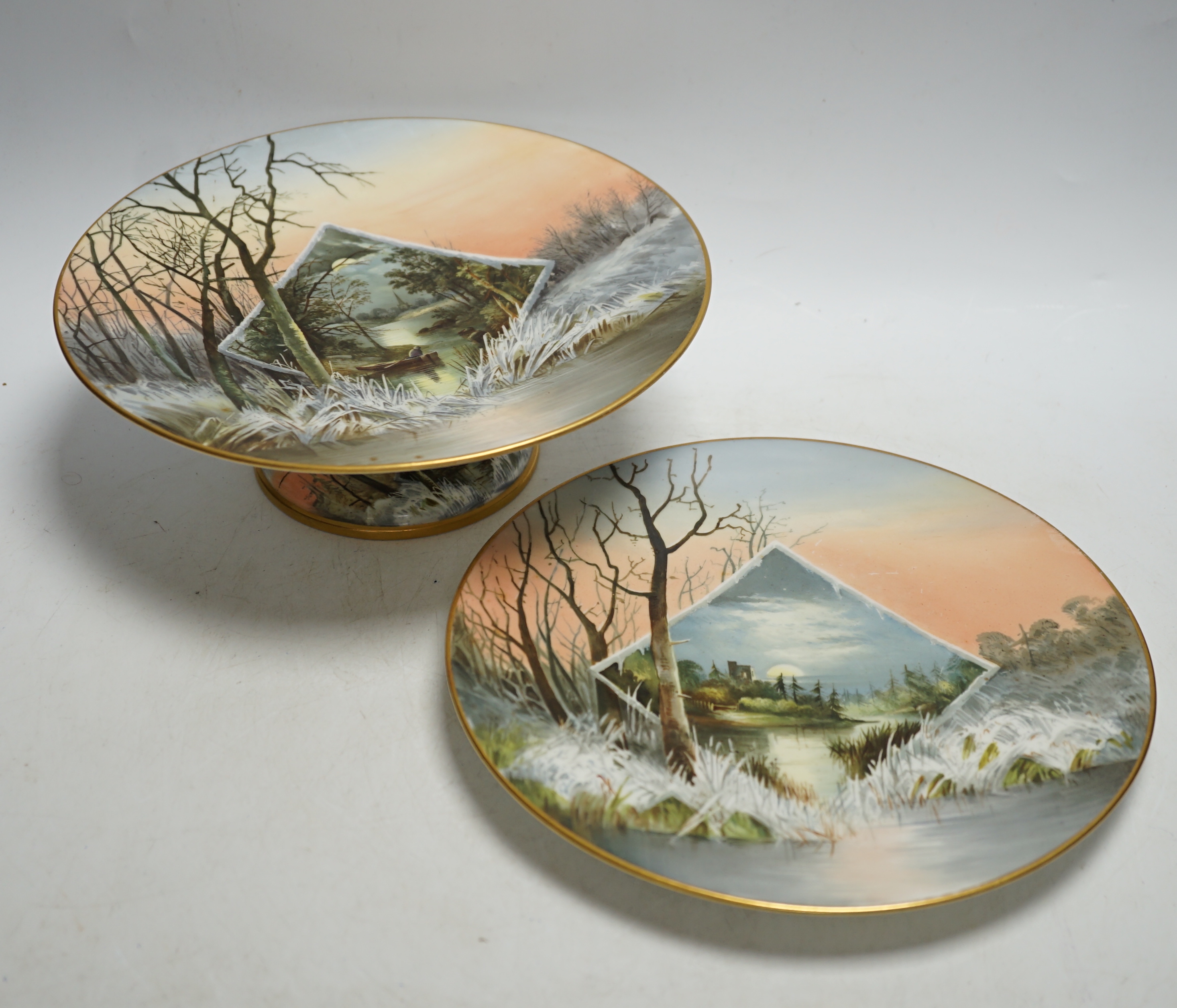 An English porcelain twelve piece dessert service, c.1875, painted with moonlit winter scenes, comprising of eight plates and four pedestal serving dishes, diameter of plates 22.5cm